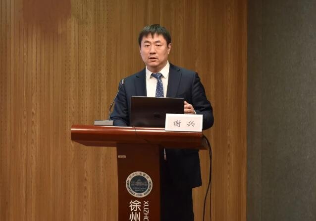 谢兴博士在交流环节作学术分享